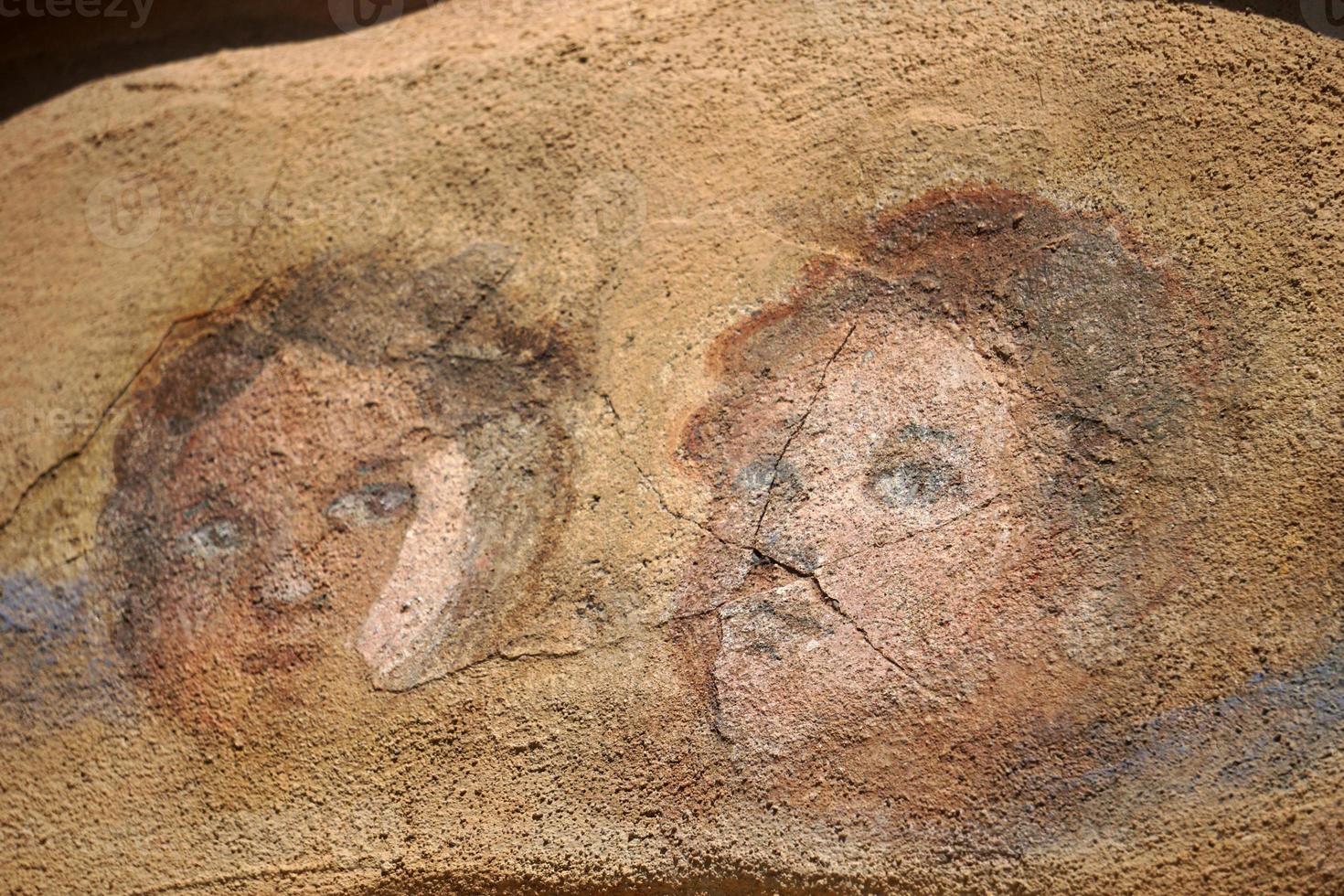 engelen schilderij Aan oud huis steen muur achtergrond foto