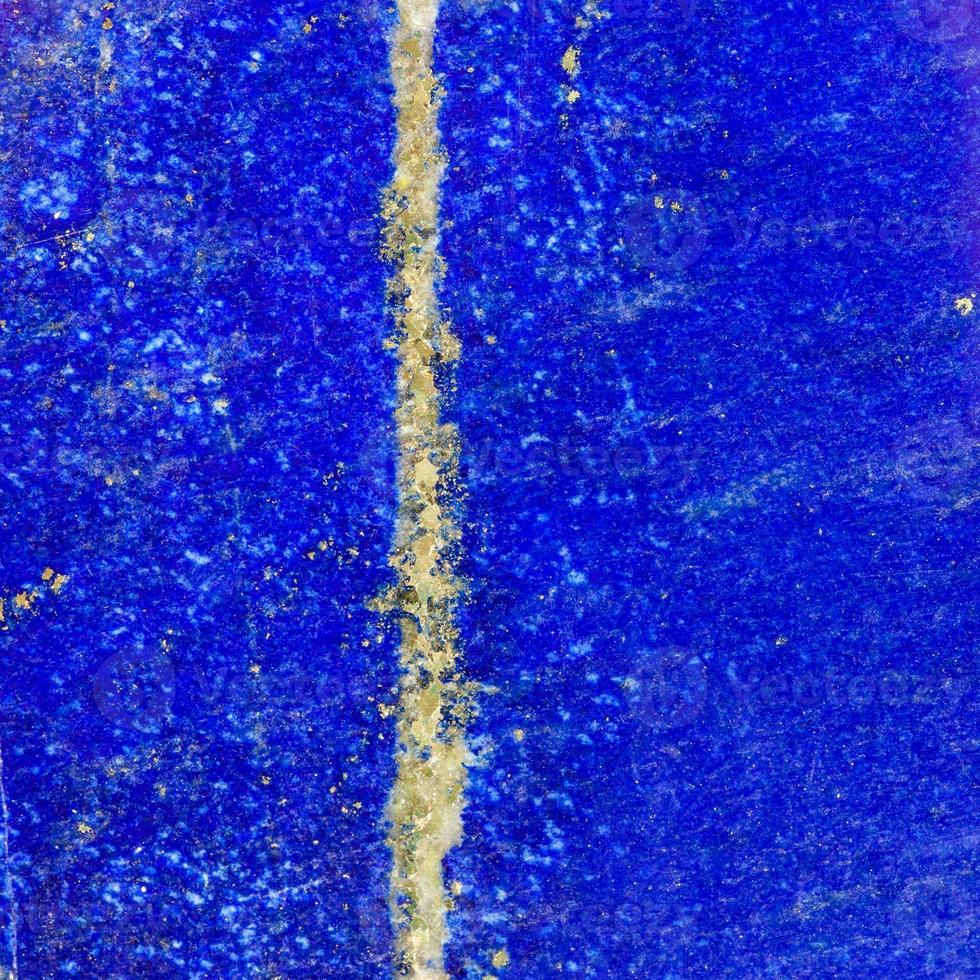 gepolijst oppervlakte van lapis lazuli mineraal edelsteen foto