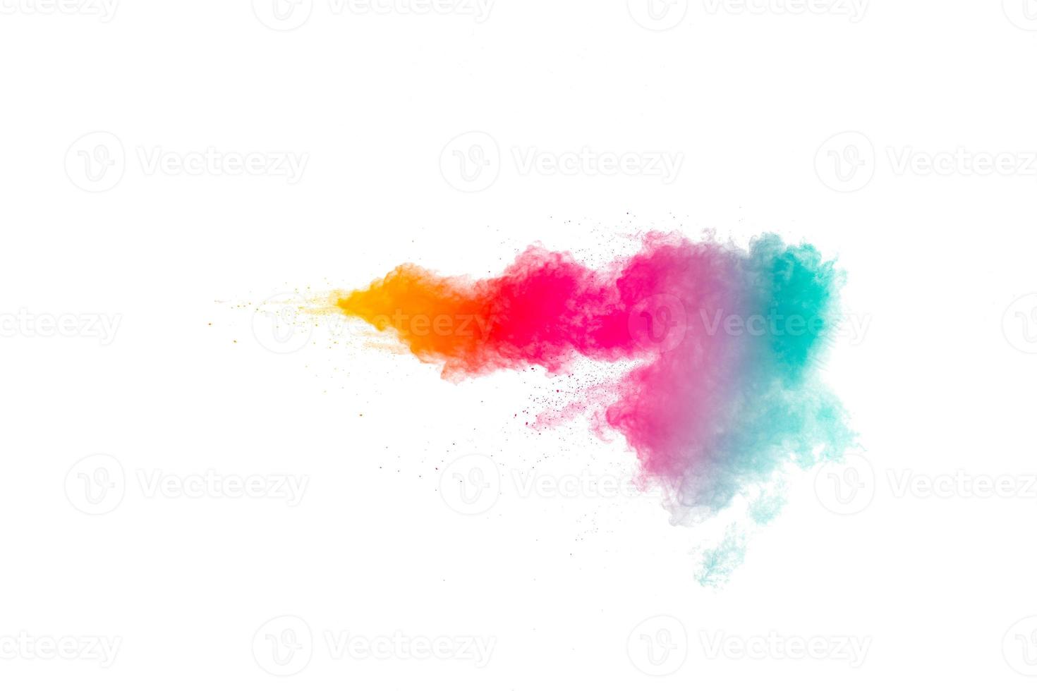 kleurrijke achtergrond van pastel poeder explosie. regenboog kleur stof splash op witte achtergrond. foto