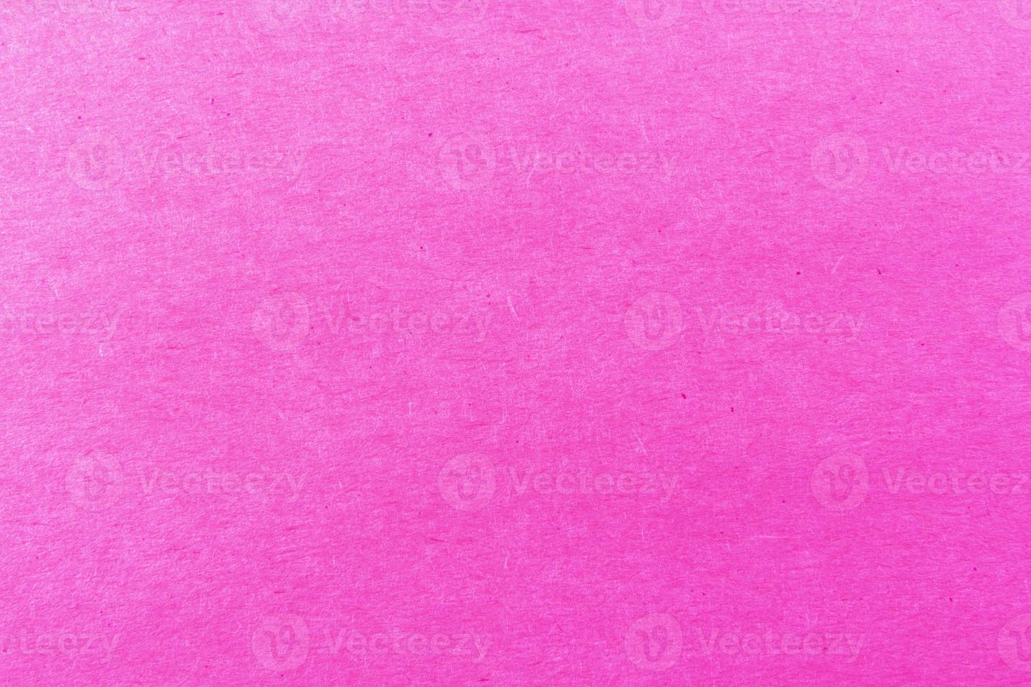 close-up shot van licht roze papier structuurpatroon voor achtergrond foto