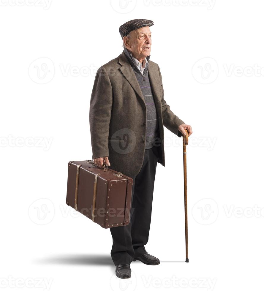 oud Mens met koffer foto