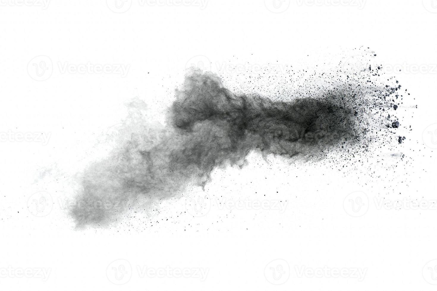 zwart poeder explosie op witte background.black stofdeeltjes splash. foto