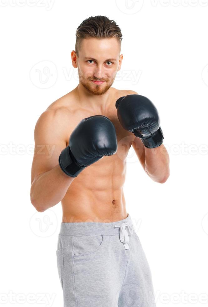 atletisch aantrekkelijk Mens vervelend boksen handschoenen Aan de wit foto