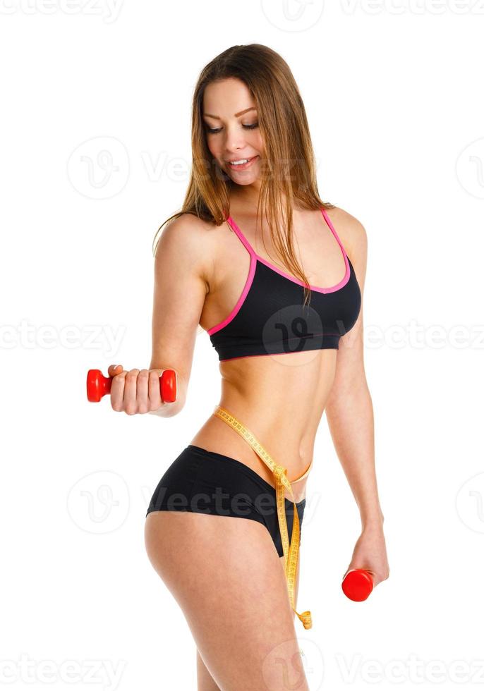 mooi sport vrouw met halters aan het doen sport oefening, geïsoleerd Aan wit foto