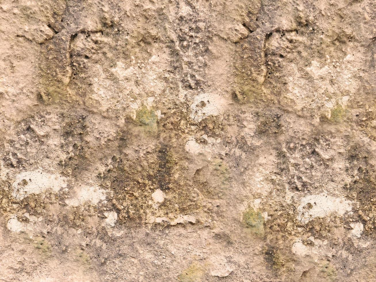 rots of stenen muur voor achtergrond of textuur foto