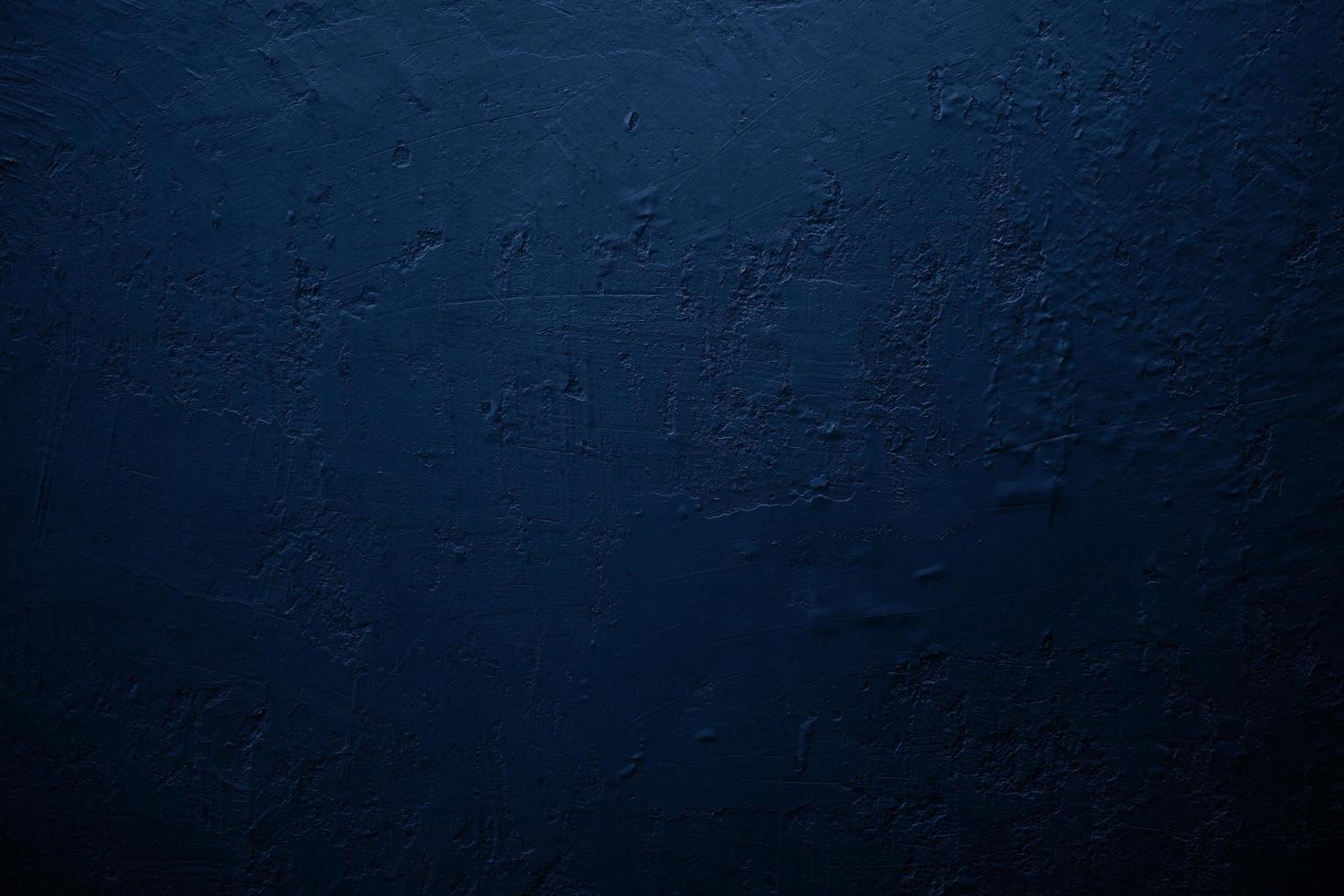 wijnoogst grunge blauw beton structuur muur achtergrond met vignet. foto