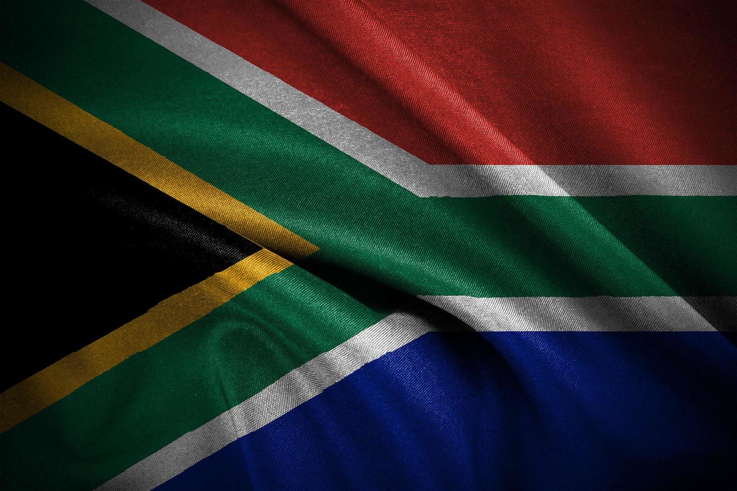 de dichtbij omhoog golvend vlag van zuiden Afrika. de zuiden Afrika vlag in beweging glad foto