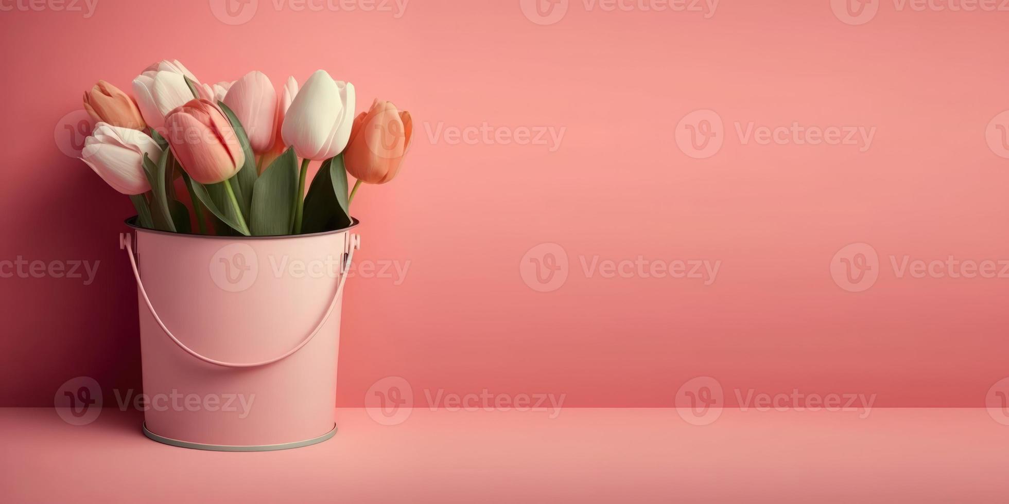 een emmer van tulpen Aan roze achtergrondkleur met een schoon leeg ruimte foto