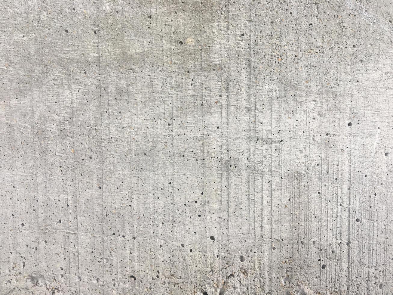 grijze betonnen muurruimte voor achtergrond met exemplaarruimte foto