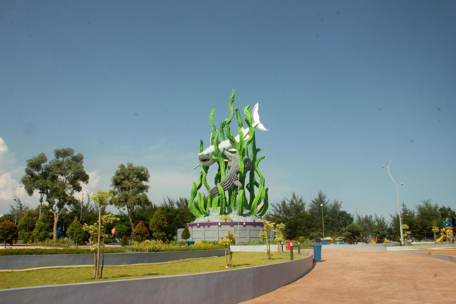 suur en jongen standbeelden in suroboyo park, Taman suroboyo, Surabaya foto