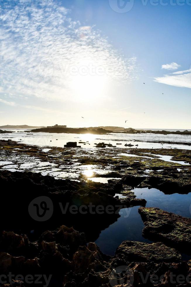 zonsondergang over de zee foto