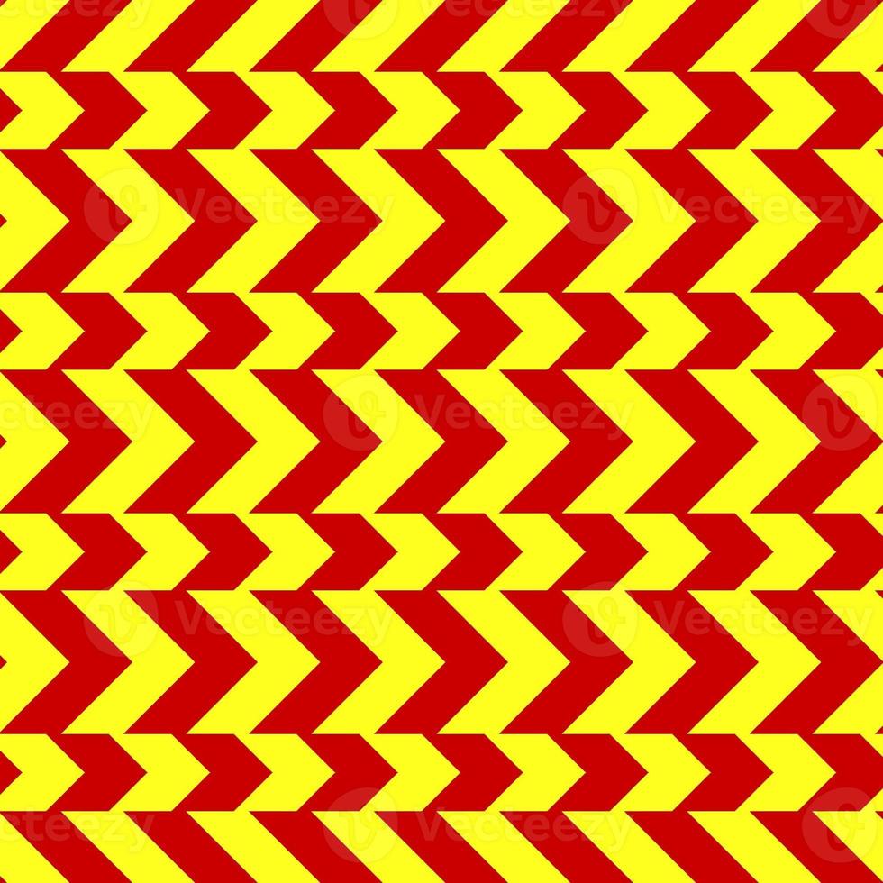 klassiek rood en geel chevron naadloos patroon. naadloos zig zag patroon achtergrond. regelmatig structuur achtergrond. geschikt voor poster, brochure, brochure, achtergrond, kaart, enz. foto