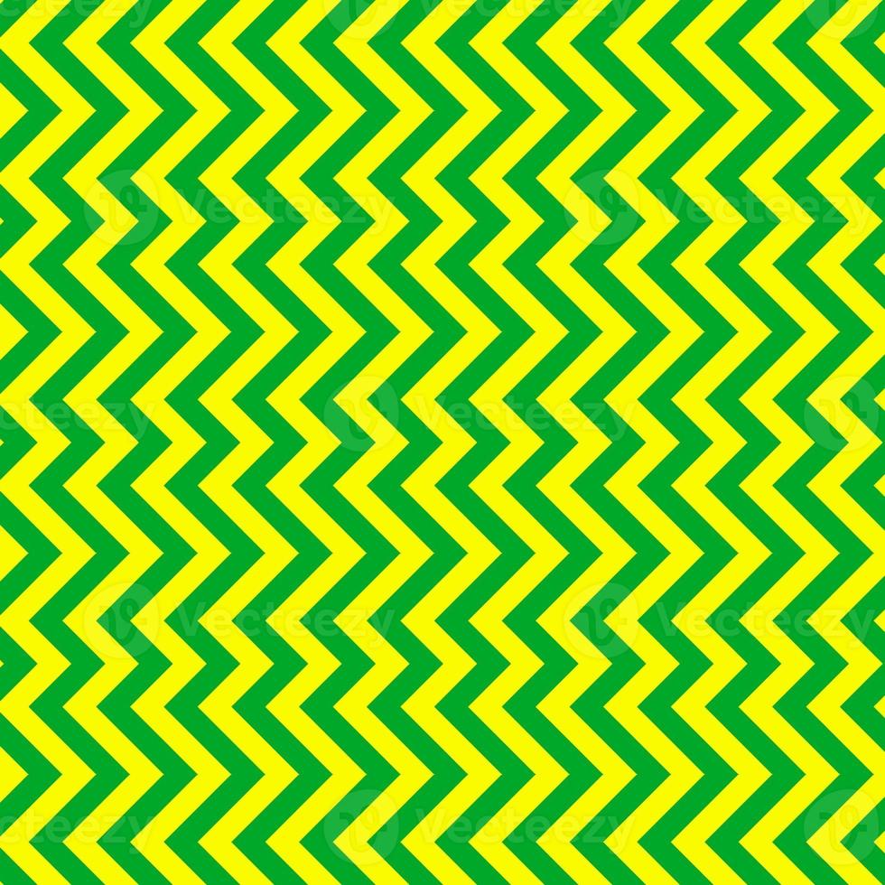klassiek groen en geel chevron naadloos patroon. naadloos zig zag patroon achtergrond. regelmatig structuur achtergrond. geschikt voor poster, brochure, brochure, achtergrond, kaart, enz. foto