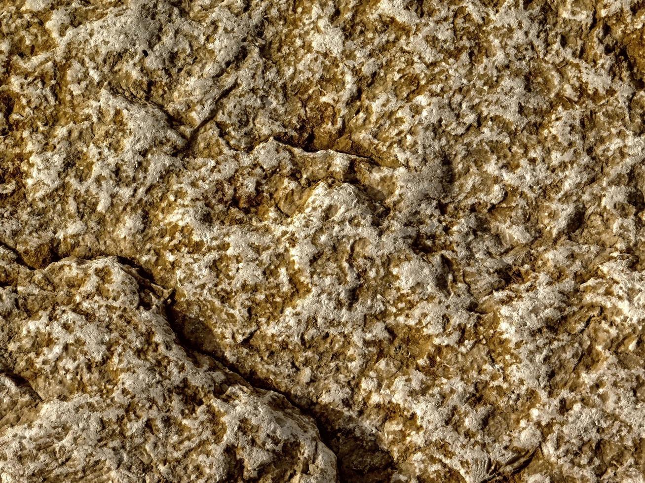 close-up van steen of rotswand voor achtergrond of textuur foto