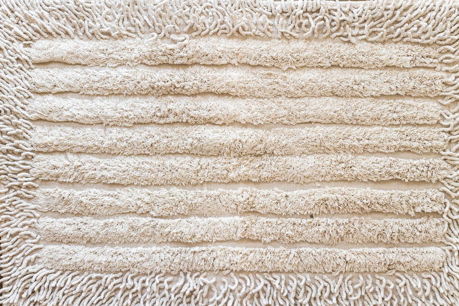 bruine handdoek close-up stof en textuur achtergrond foto