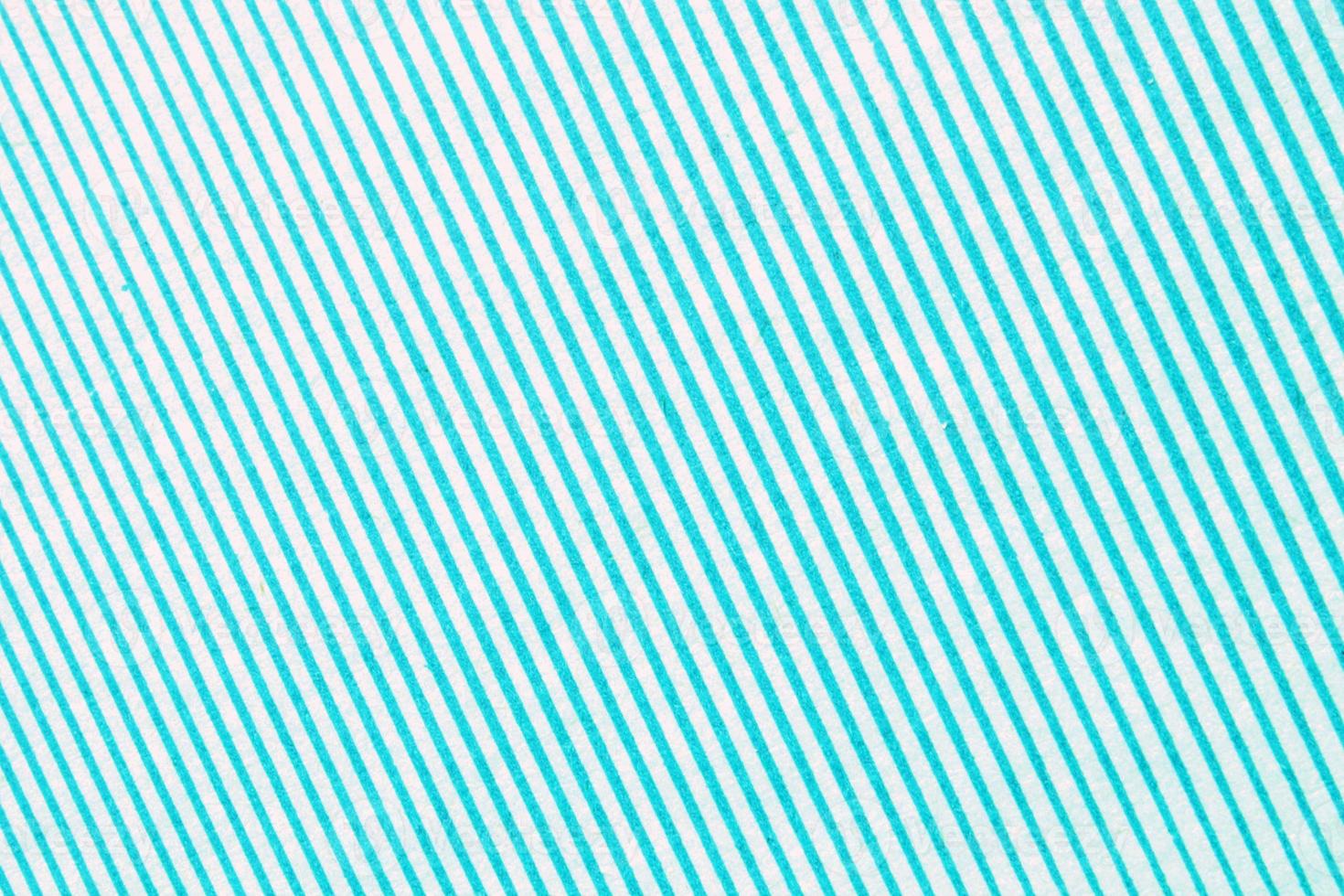 abstract papier blauw en wit meetkundig symmetrisch structuur gestreept oppervlakte diagonaal lijnen achtergrond. structuur ontwerp karton vorm achtergrond. decoratie interieur concept. plat leggen, detailopname foto