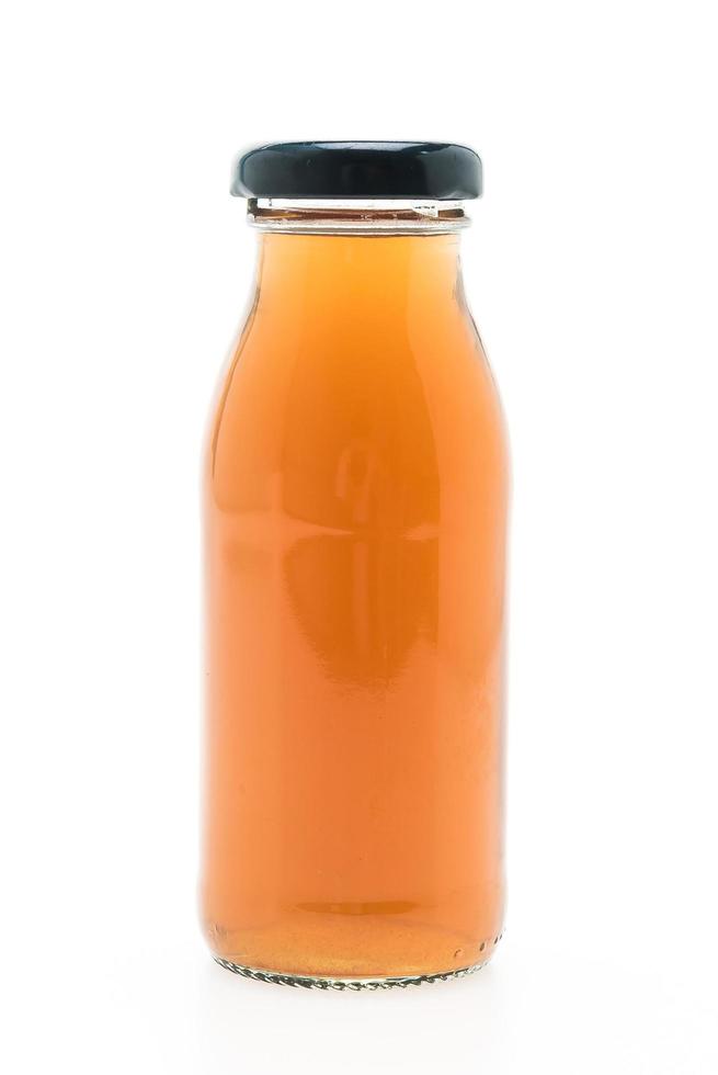 fruit en groentesap fles geïsoleerd op een witte achtergrond foto