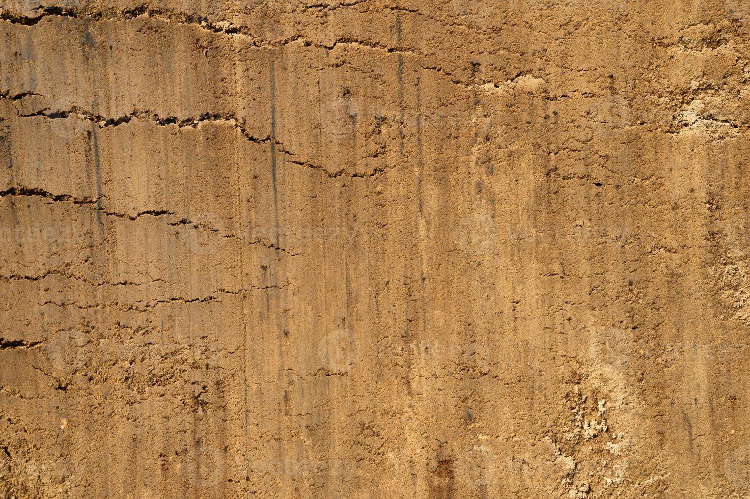 achtergrondstructuur van het gladde oppervlak van het zand foto