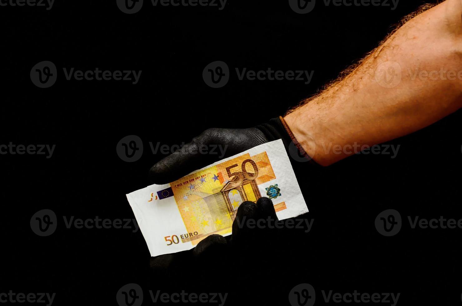 hand met geld foto