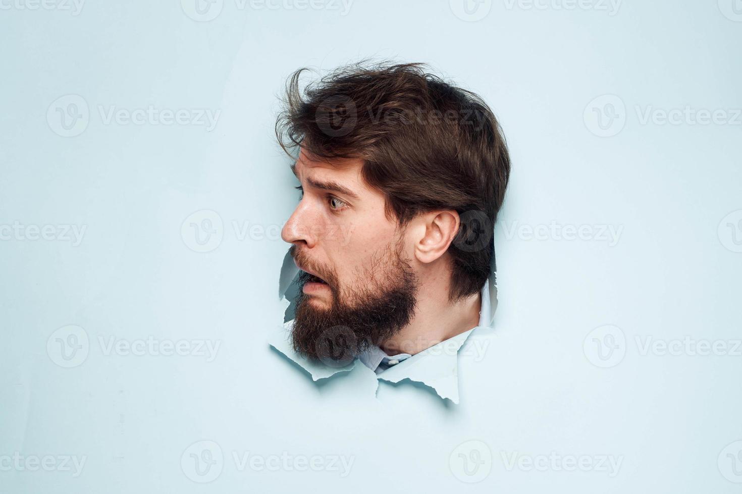 emotioneel mannetje manager kantoor blauw achtergrond werk levensstijl foto