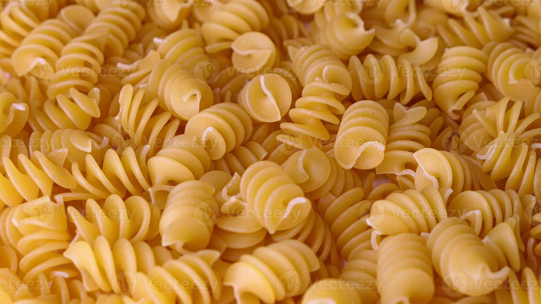 droog Italiaans pasta achtergrond gezond voedsel foto