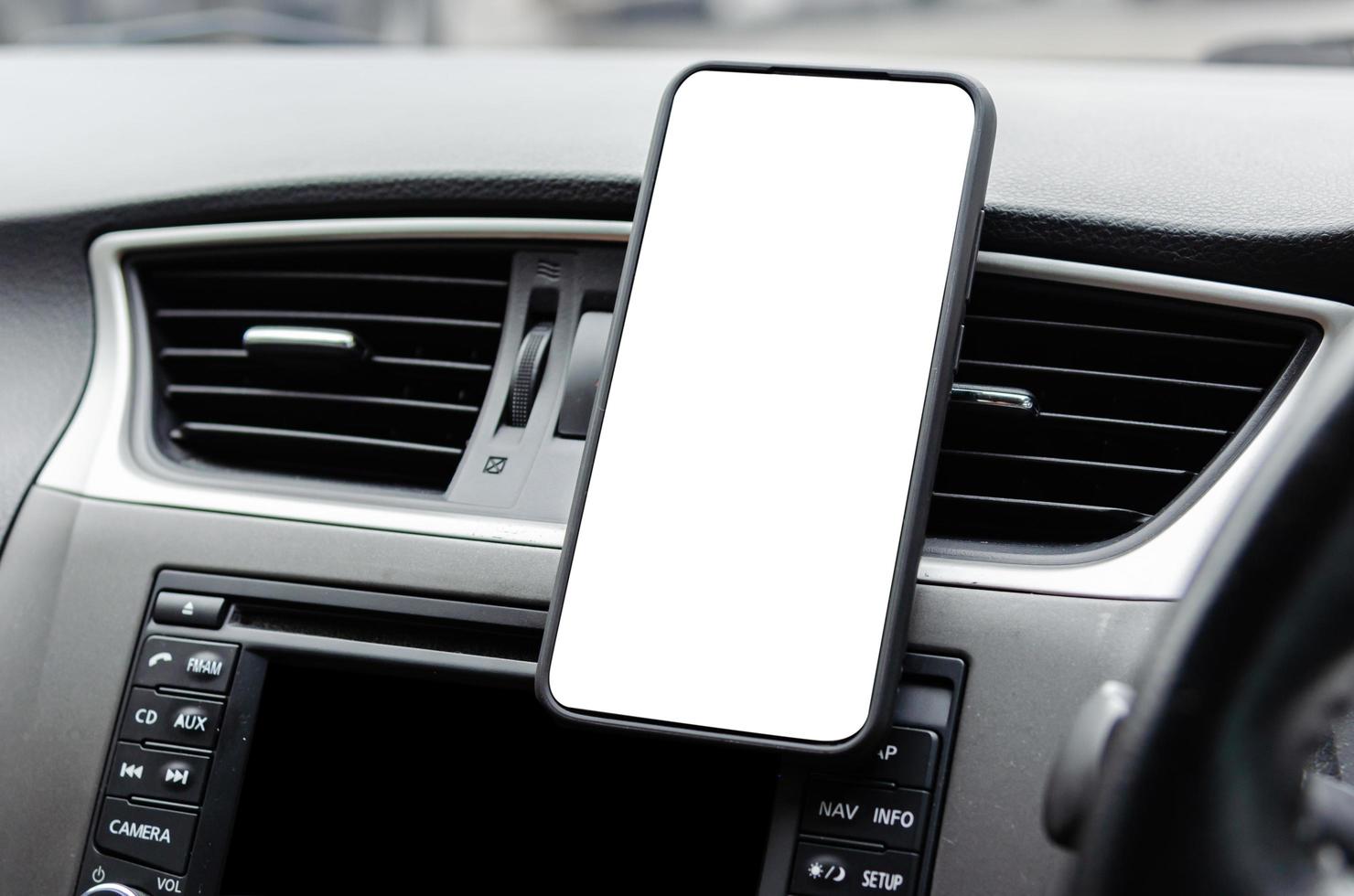 telefoon op auto dashboard mock-up foto