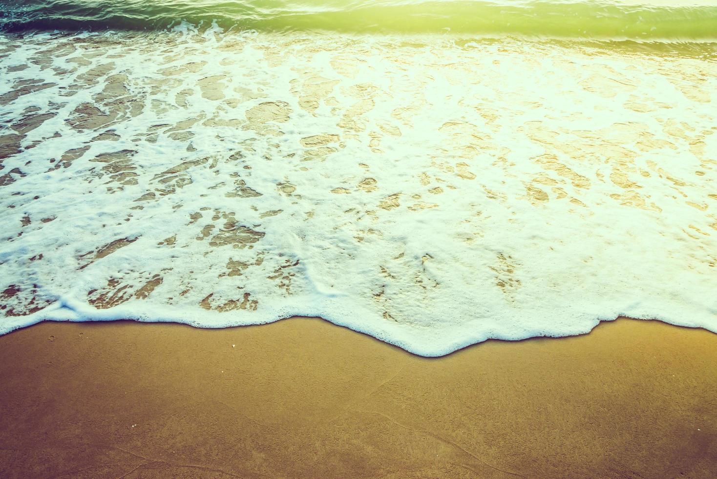 zwaai naar het strand foto