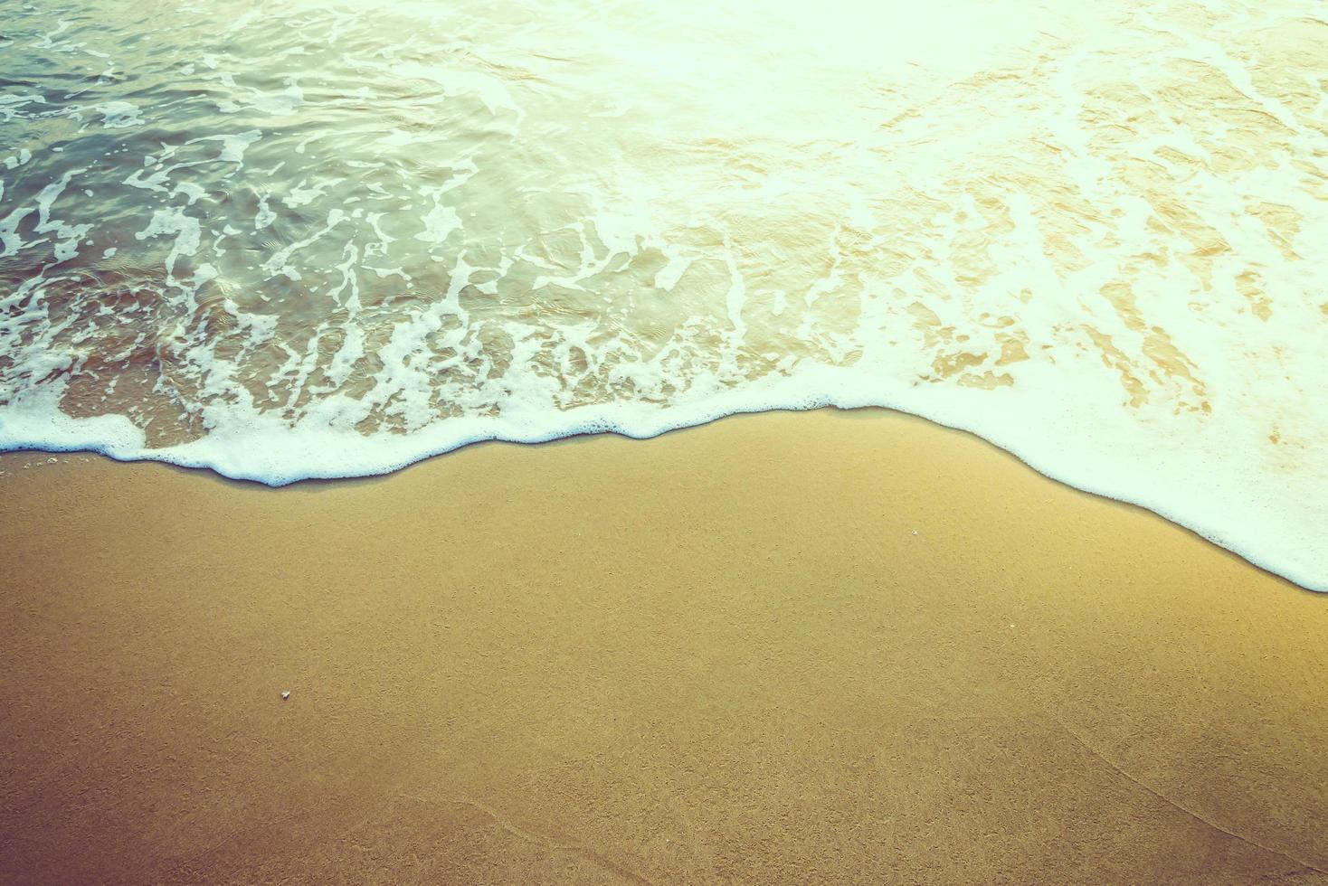 zwaai naar het strand foto