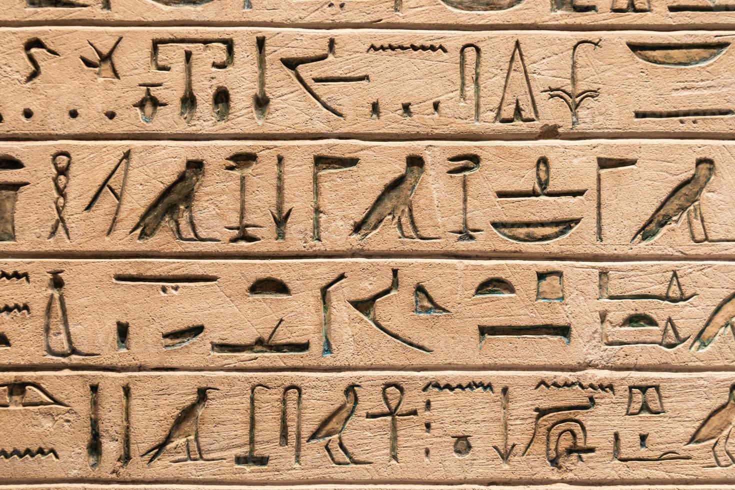 Egyptische hiërogliefen. wijnoogst achtergrond foto