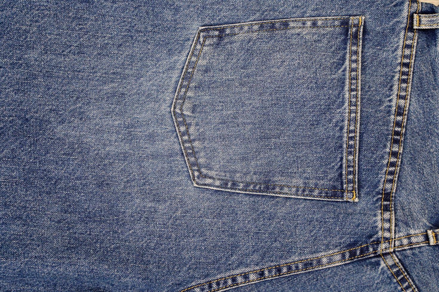 blauw denim structuur en jeans achtergrond, jeans kleding stof marine blauw abstract achtergronden, horizontaal terug zakken foto