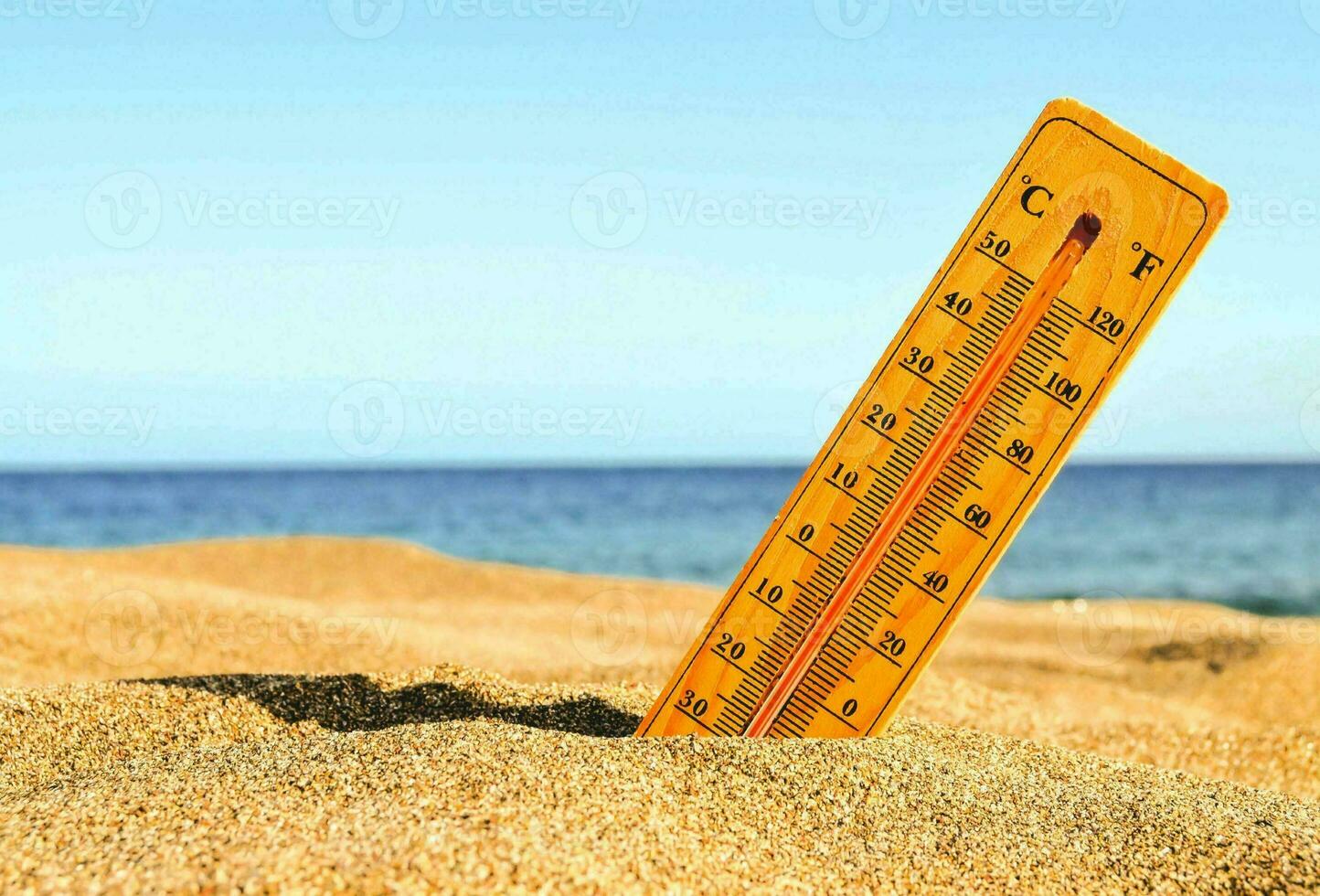 een thermometer Aan de zand foto