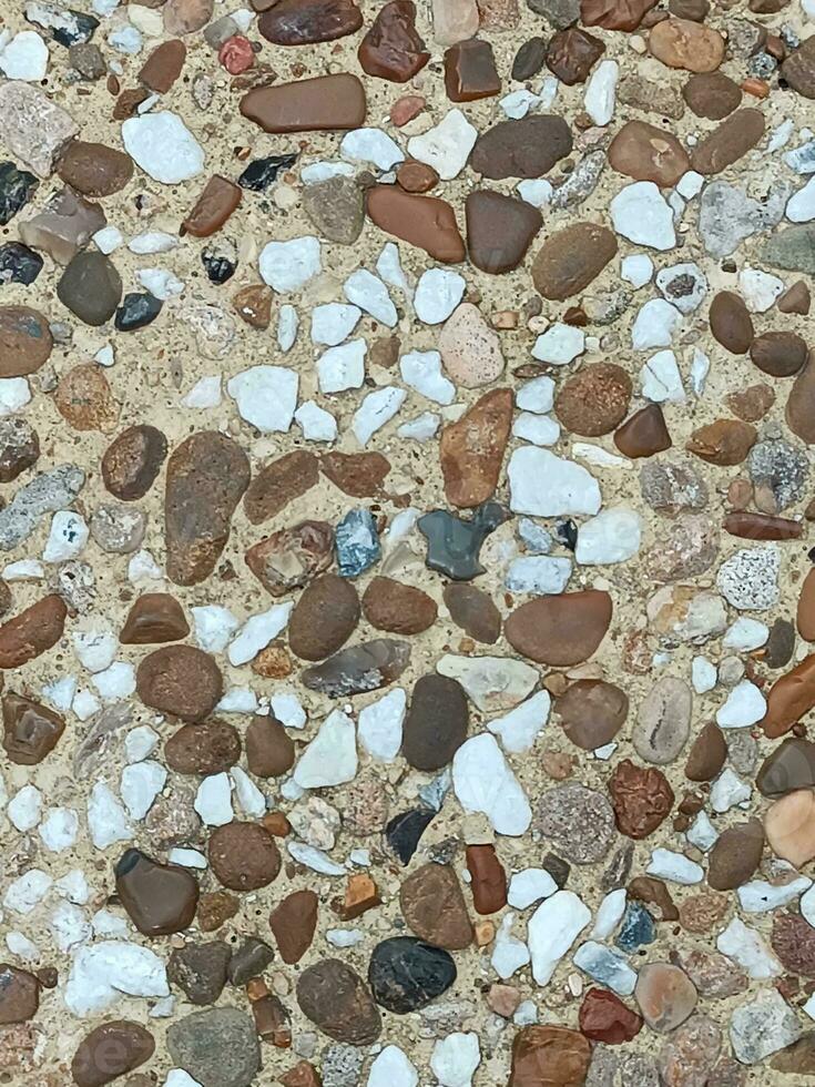 prima grind textuur. abstract achtergrond met klein stenen. foto
