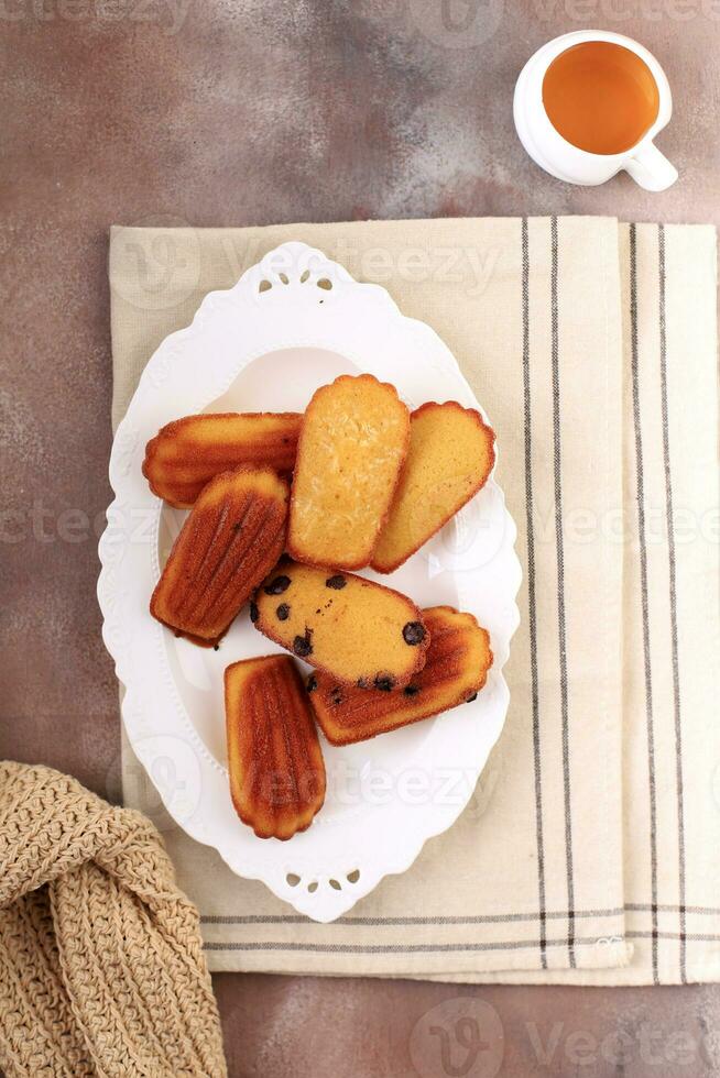 kaas, vanille, en chocola chips madeleine, Frans boter taart foto