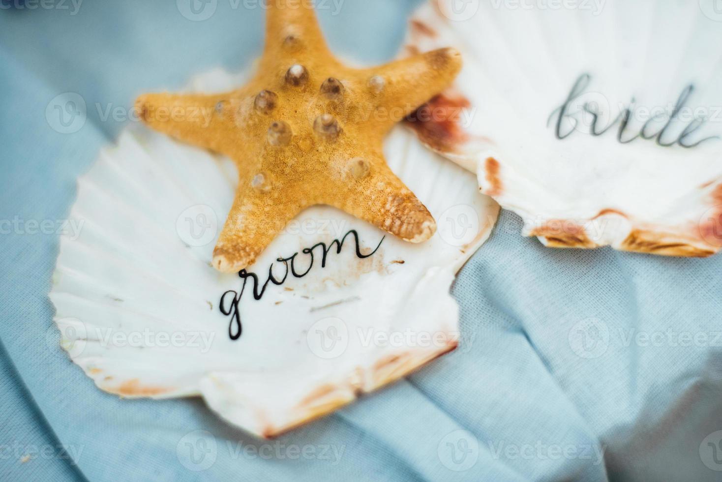 zeesterren en zeeschelp bruiloft decor foto