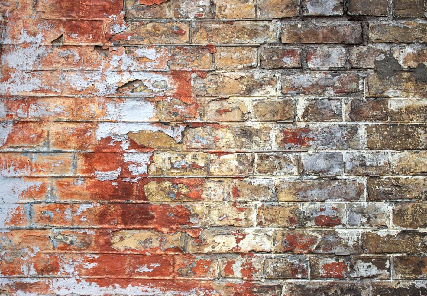 oude gebarsten bakstenen muur textuur foto