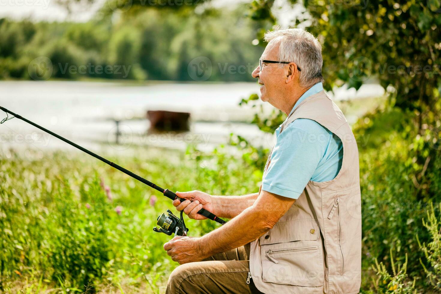een senior Mens visvangst foto
