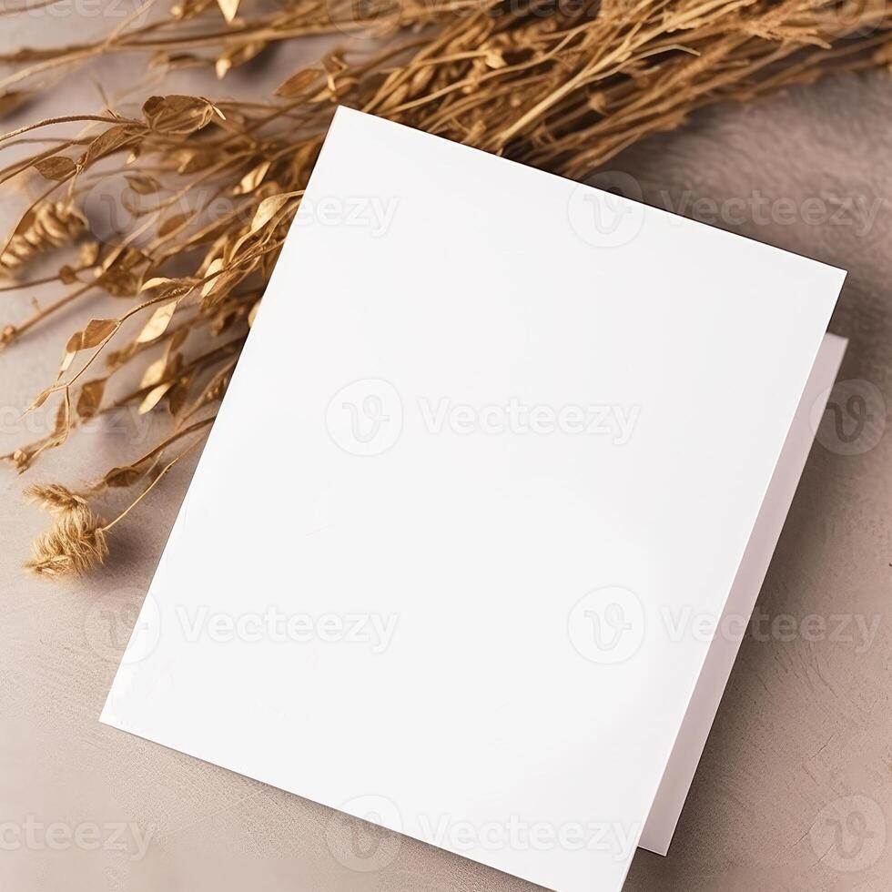 top visie van blanco wit papier kaart mockup en gouden droog bloemen of gras Aan beige graan structuur achtergrond, generatief ai. foto