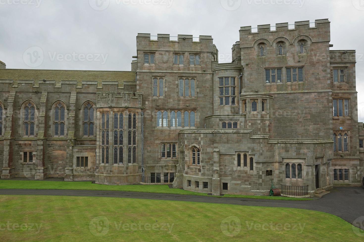 mening van bamburgh kasteel in northumberland engeland uk foto