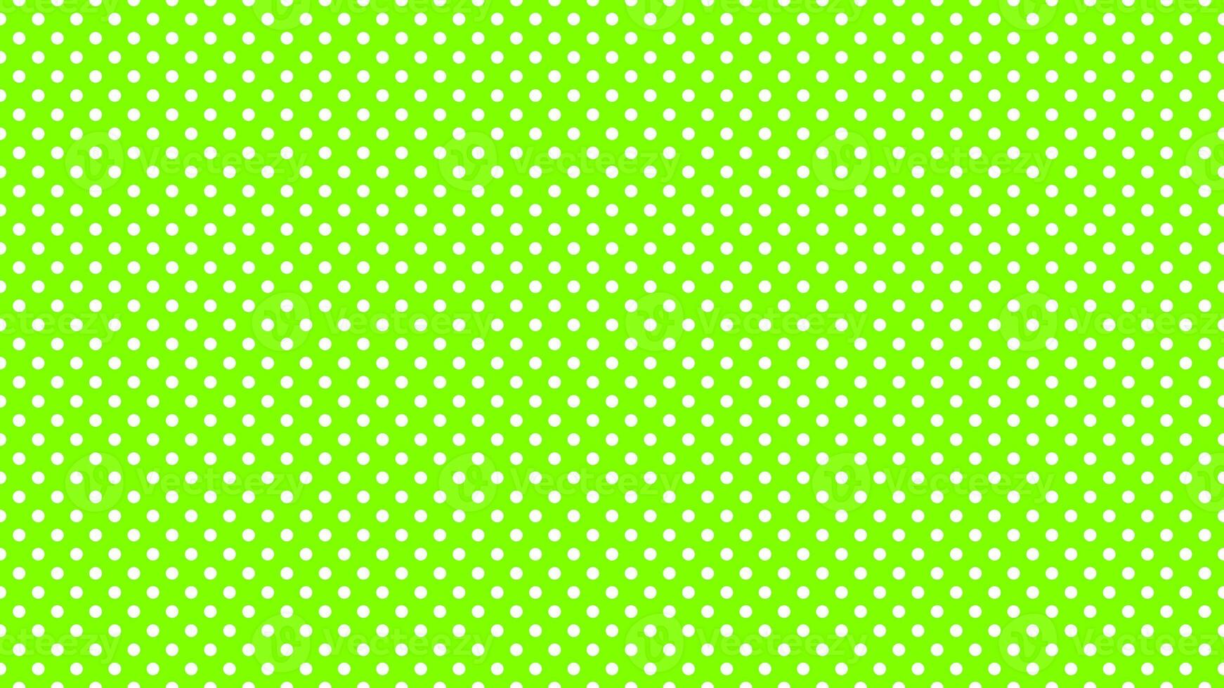 wit polka dots over- chartreuse achtergrond foto