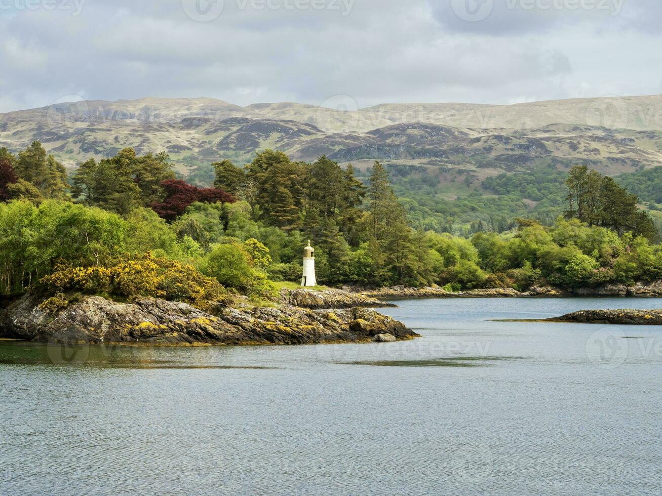 visie van caladh vuurtoren in Glen caladh haven, argyll, Schotland foto