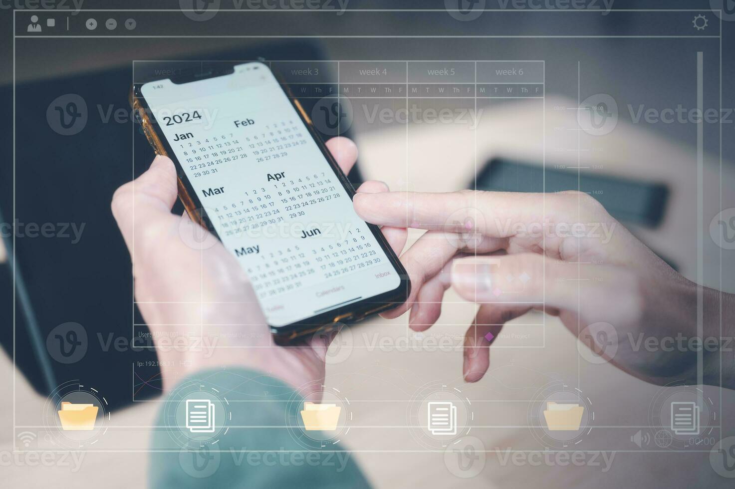 concept van tijd beheer financieel planning en herinnering voor 2024. Mens gebruik makend van smartphone werken met kalender 2024, bedrijf planning afzet en investering, schema afspraak vergadering foto