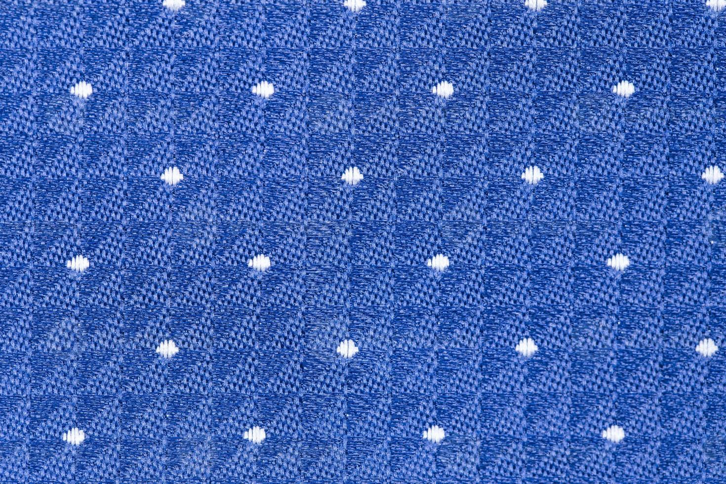 stevige achtergrond van blauwe stof met een structuurpatroon foto