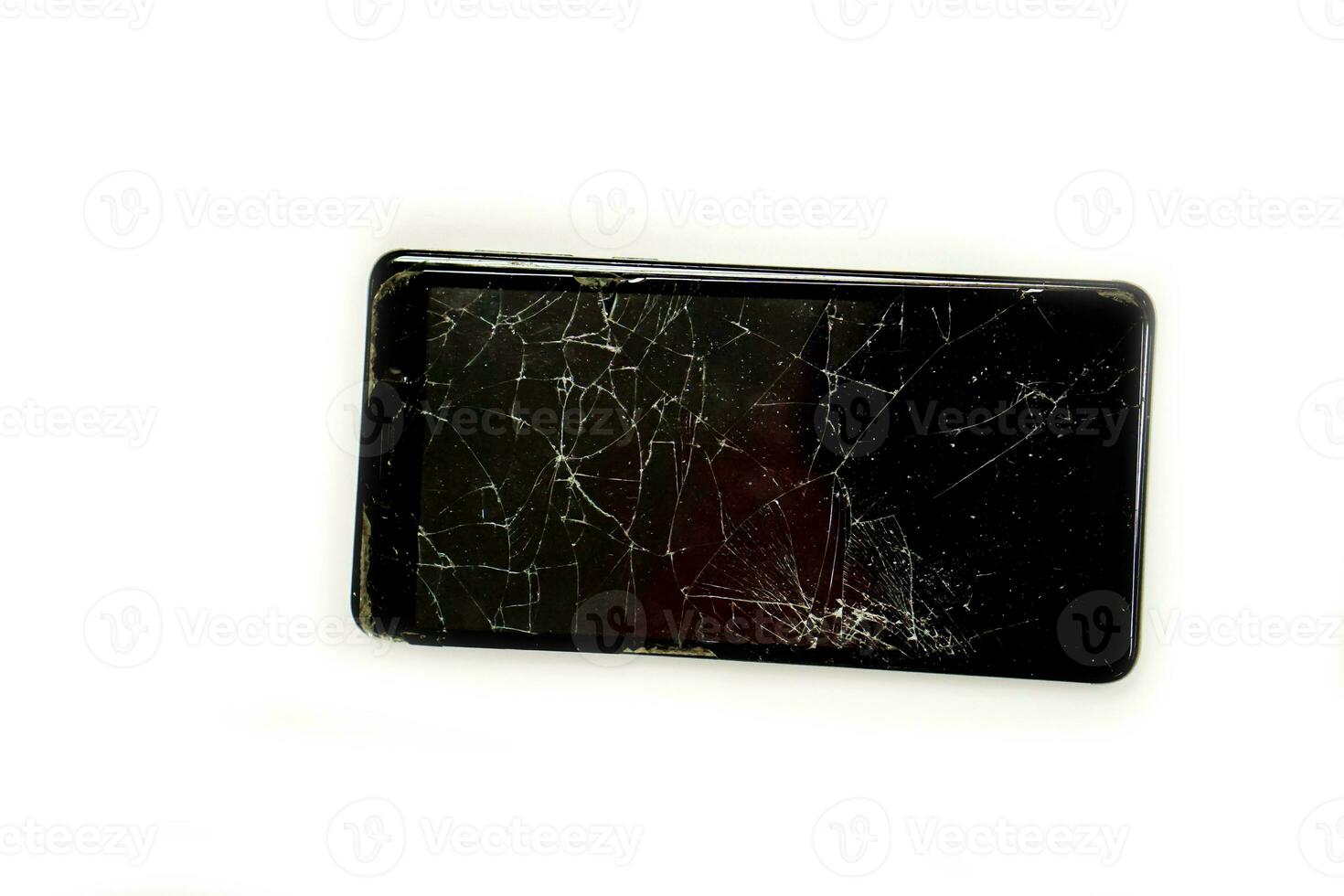 top visie gebroken en Trekken naar beneden van zwart mobiel telefoon isoleren Aan wit achtergrond. foto