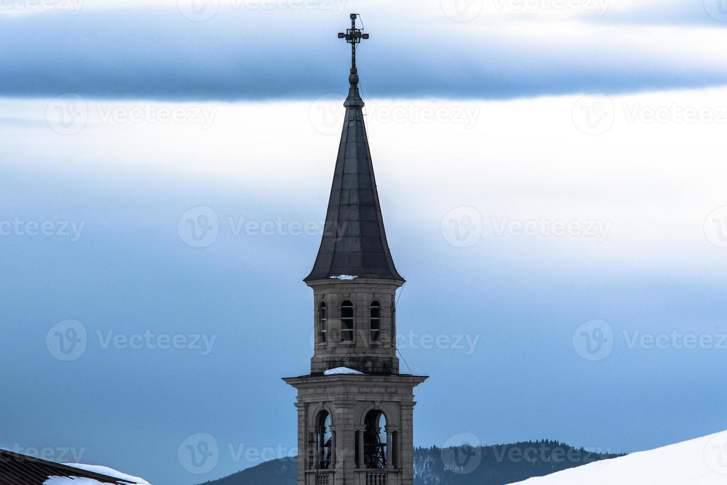 klokkentoren op blauwe hemel één foto