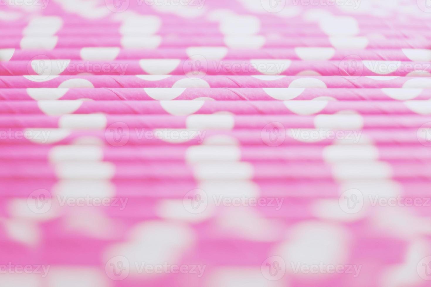 een geweldige en mooie macro met een scherptediepte over roze rietjes met stippen foto