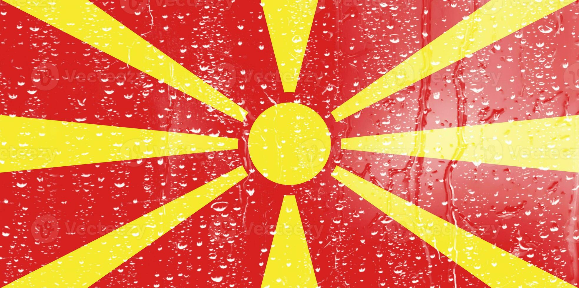 3d vlag van noorden Macedonië Aan een glas met water laten vallen achtergrond. foto