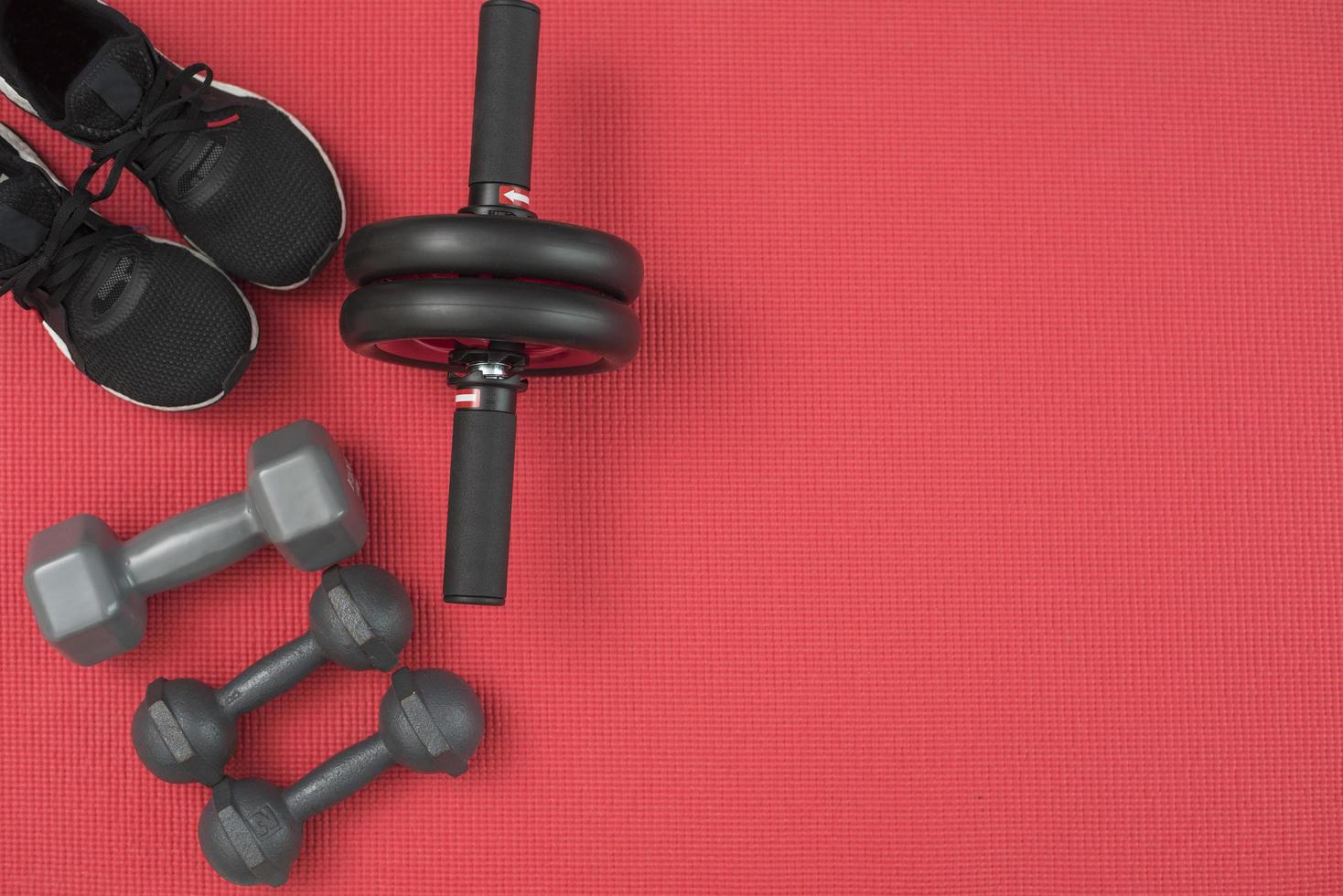 fitnessapparatuur bovenaanzicht, rood en zwart foto