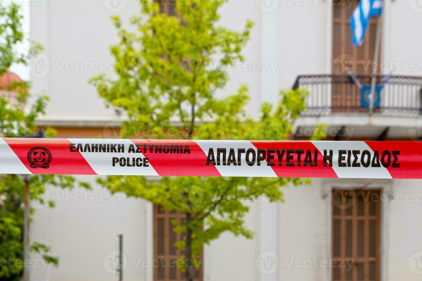 Grieks wit en rood Politie plakband foto