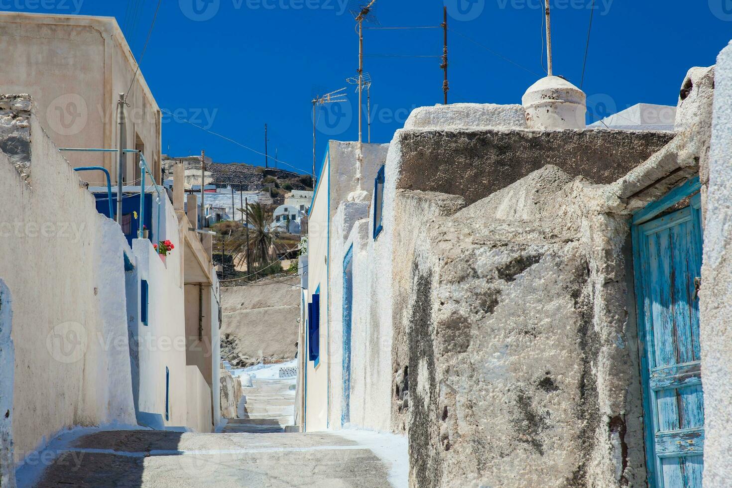 steegjes Bij akrotini dorp in Santorini eiland foto