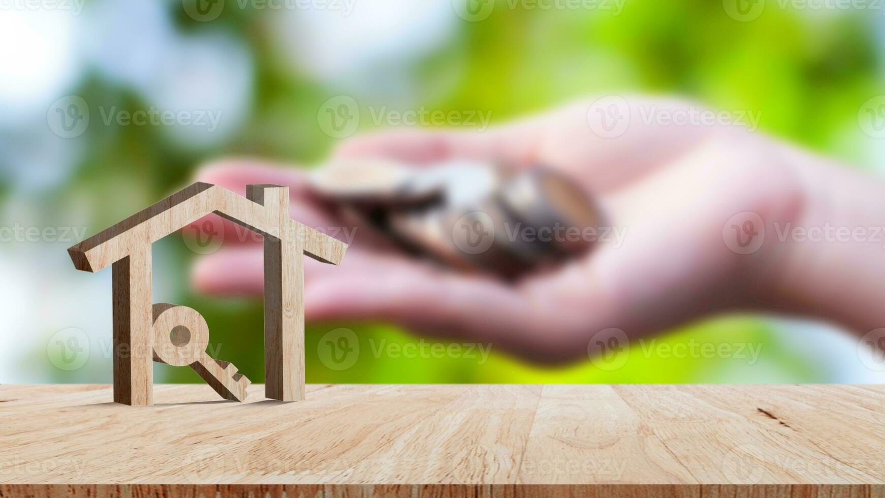 mockup houten huis en sleutel Aan houten tafel, concept van echt landgoed investering. planning spaargeld geld van munten kopen huis concept voor eigendom, hypotheek en echt landgoed investering. foto
